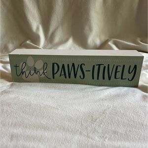 Home Decor wooden sign that says “Think Paws-itively”